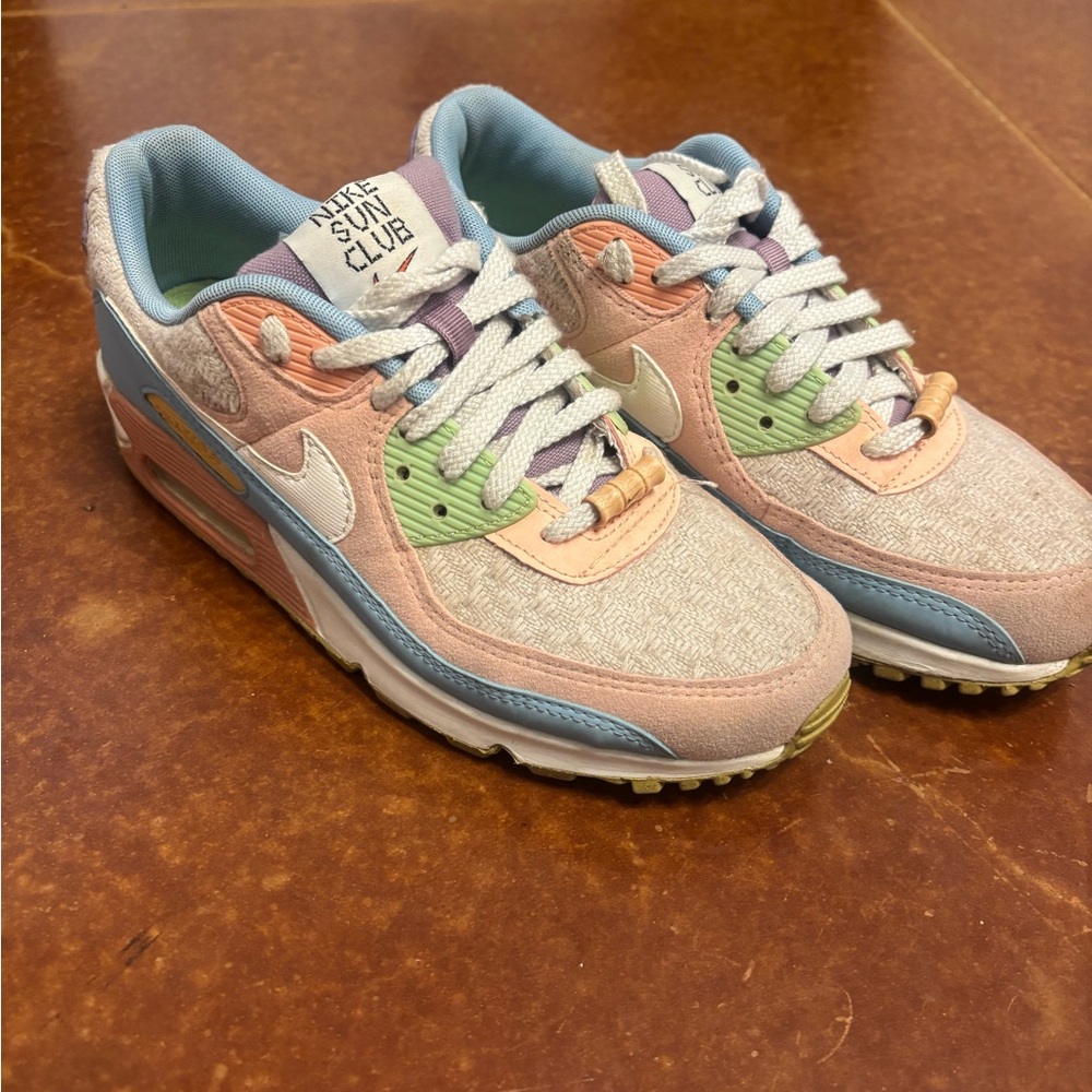 Nike Sneakers with Pastel Pink and Blue Accents
